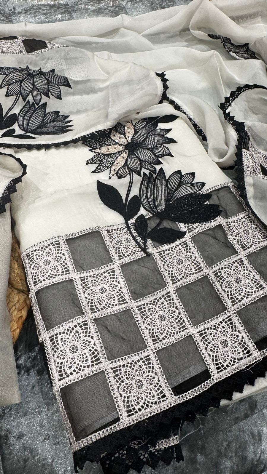 Pure organza with thread and beads work over the motifs and lace work dupatta