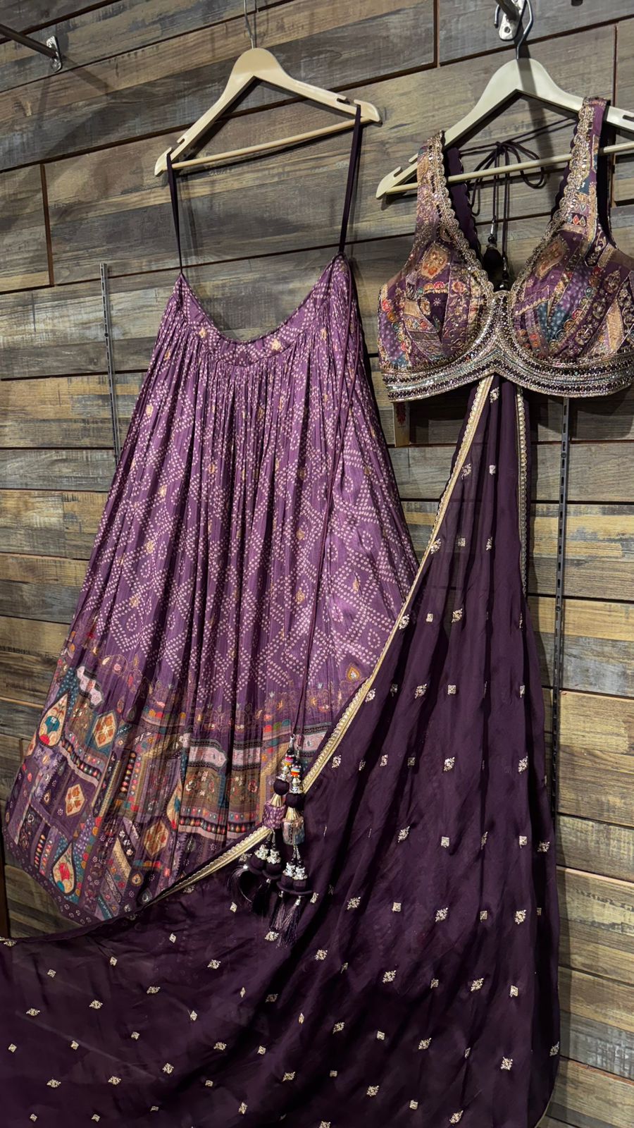 Plum Color Jamdani Silk (All weather silk) with mesmerising traditional weaving with jaipuri print along with intricate pearl & mirror handwork on blouse teamed up with organza dupatta in brinjal color to brighten up your wedding affairs