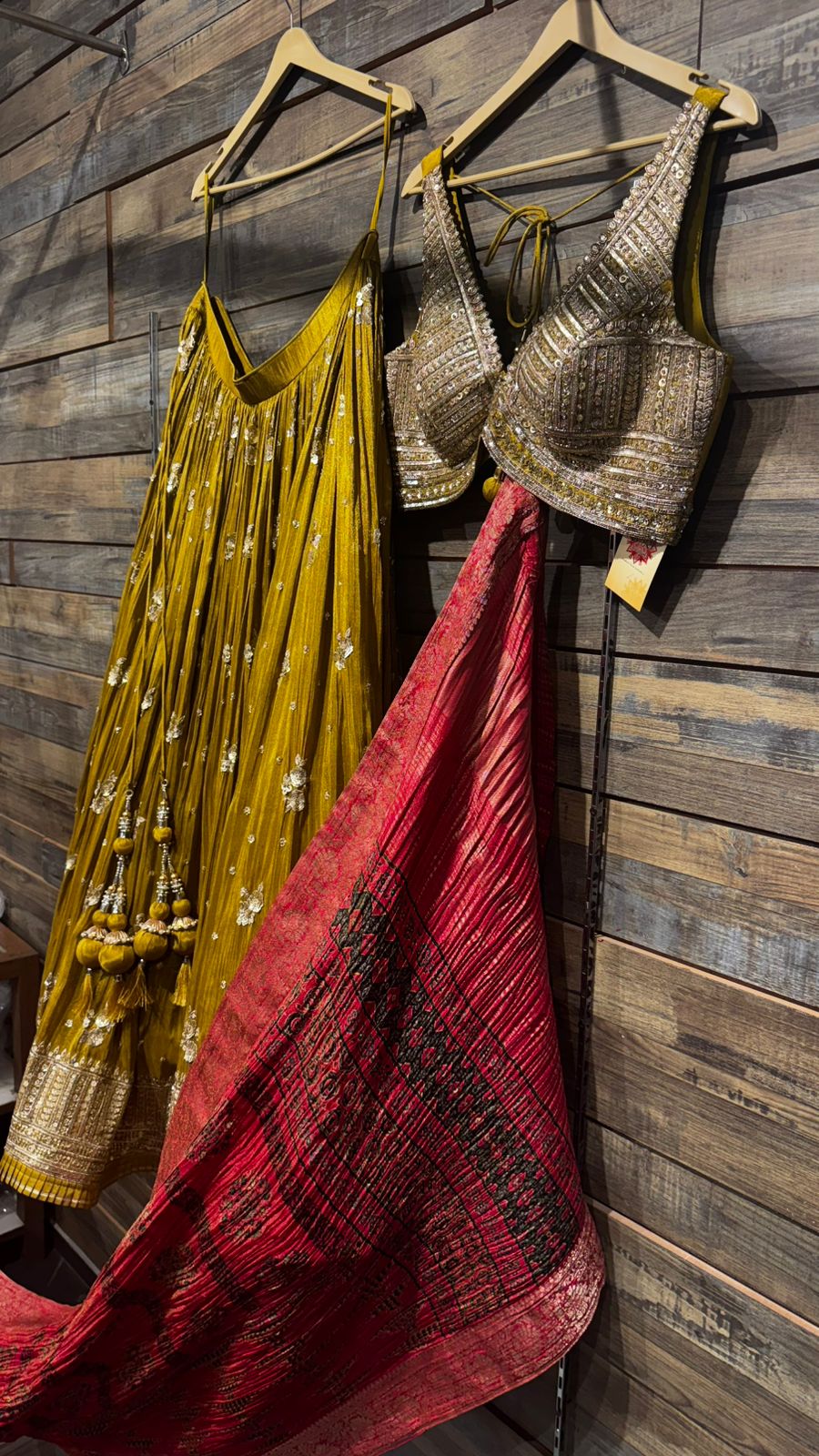 Mustard Color Lehenga with beautiful crush banarsi tissue fabric with handwork highlights over the skirt and intricate handwork on blouse and crush tissue dupatta in ajrak print