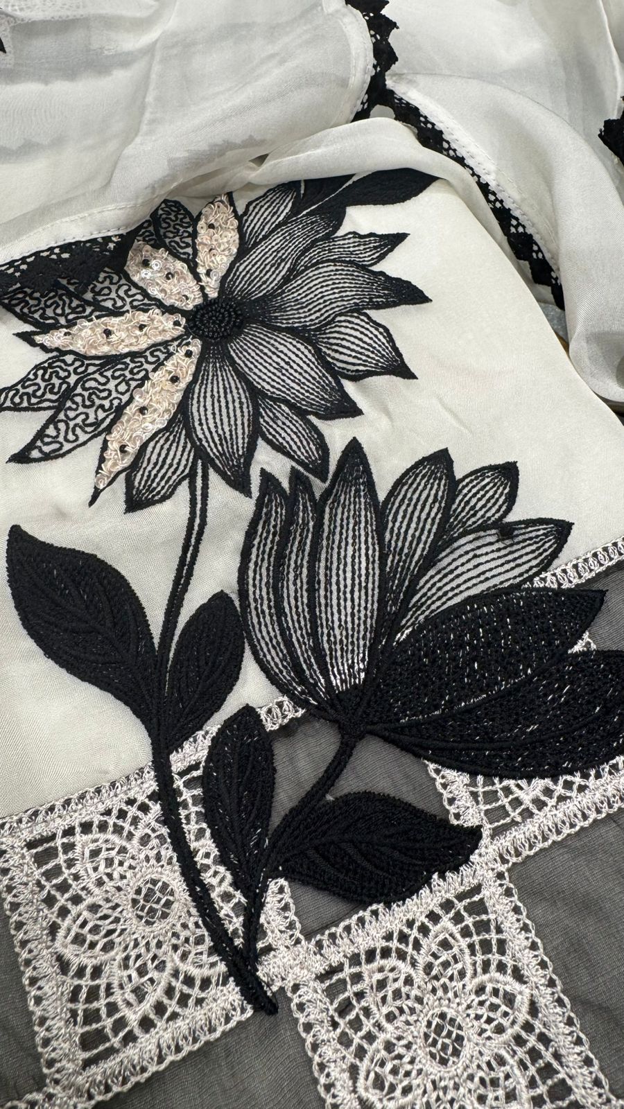 Pure organza with thread and beads work over the motifs and lace work dupatta