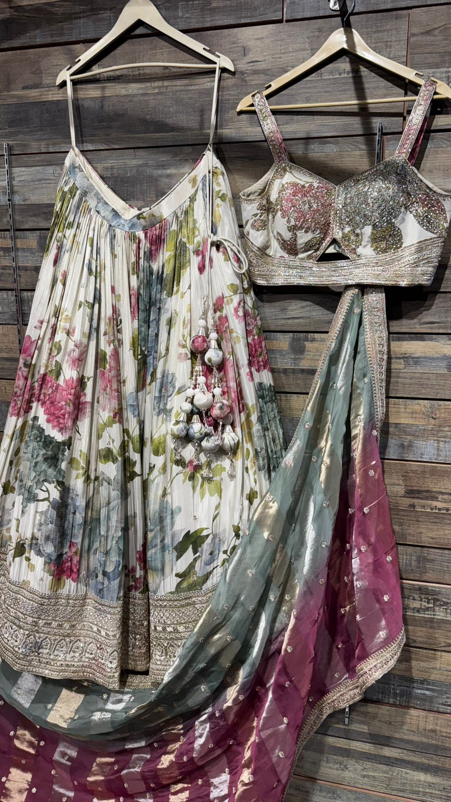 Pure Kora Silk ( All weather silk) with mesmerising floral digital print with handwork over the skirt border and complete blouse highlights teamed up with dual color organza dupatta with beautiful border must have for wedding ceremonial events