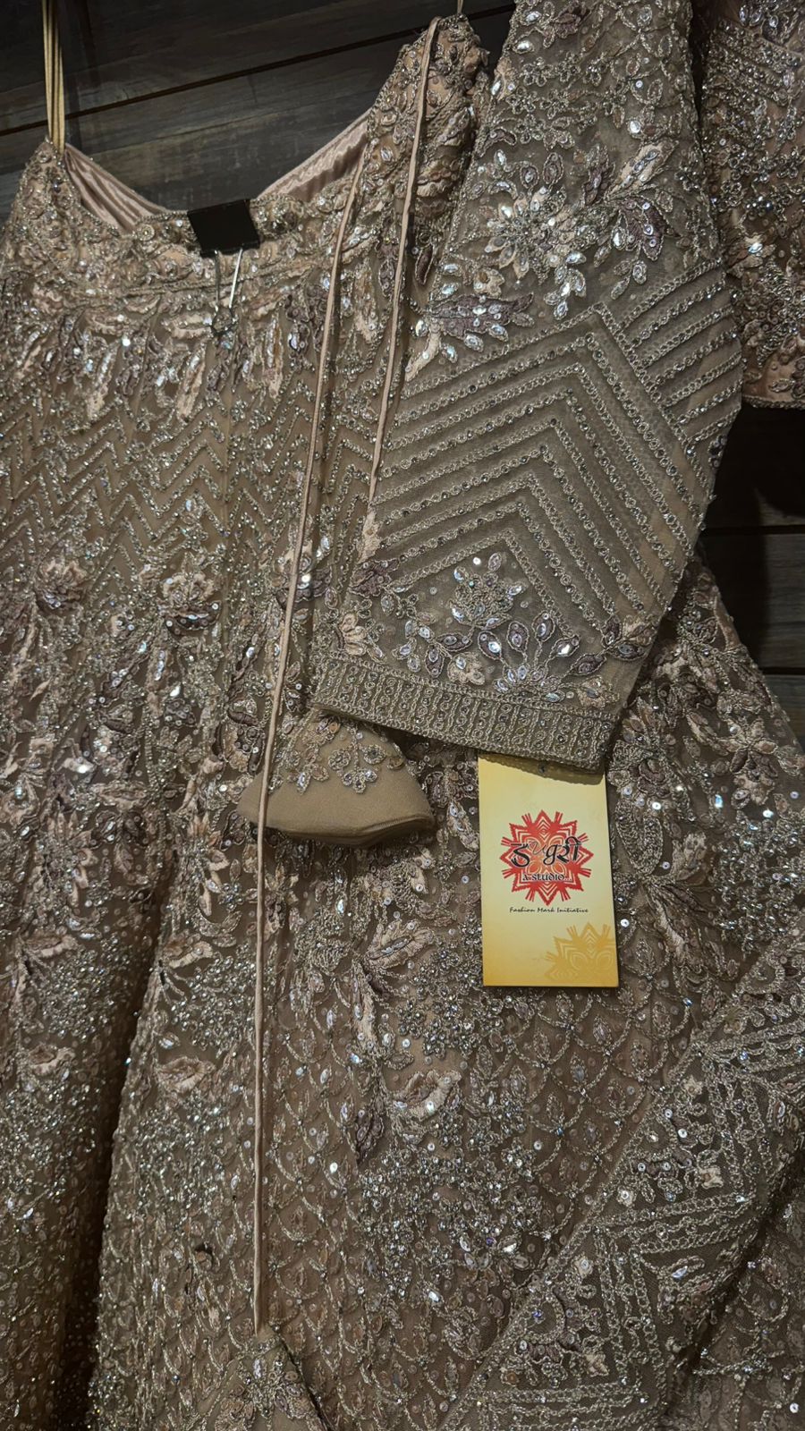 Imported Net Golden Lehenga with beautiful handwork in thread and sequence teamed with full handwork dupatta and blouse to brighten up your wedding affairs