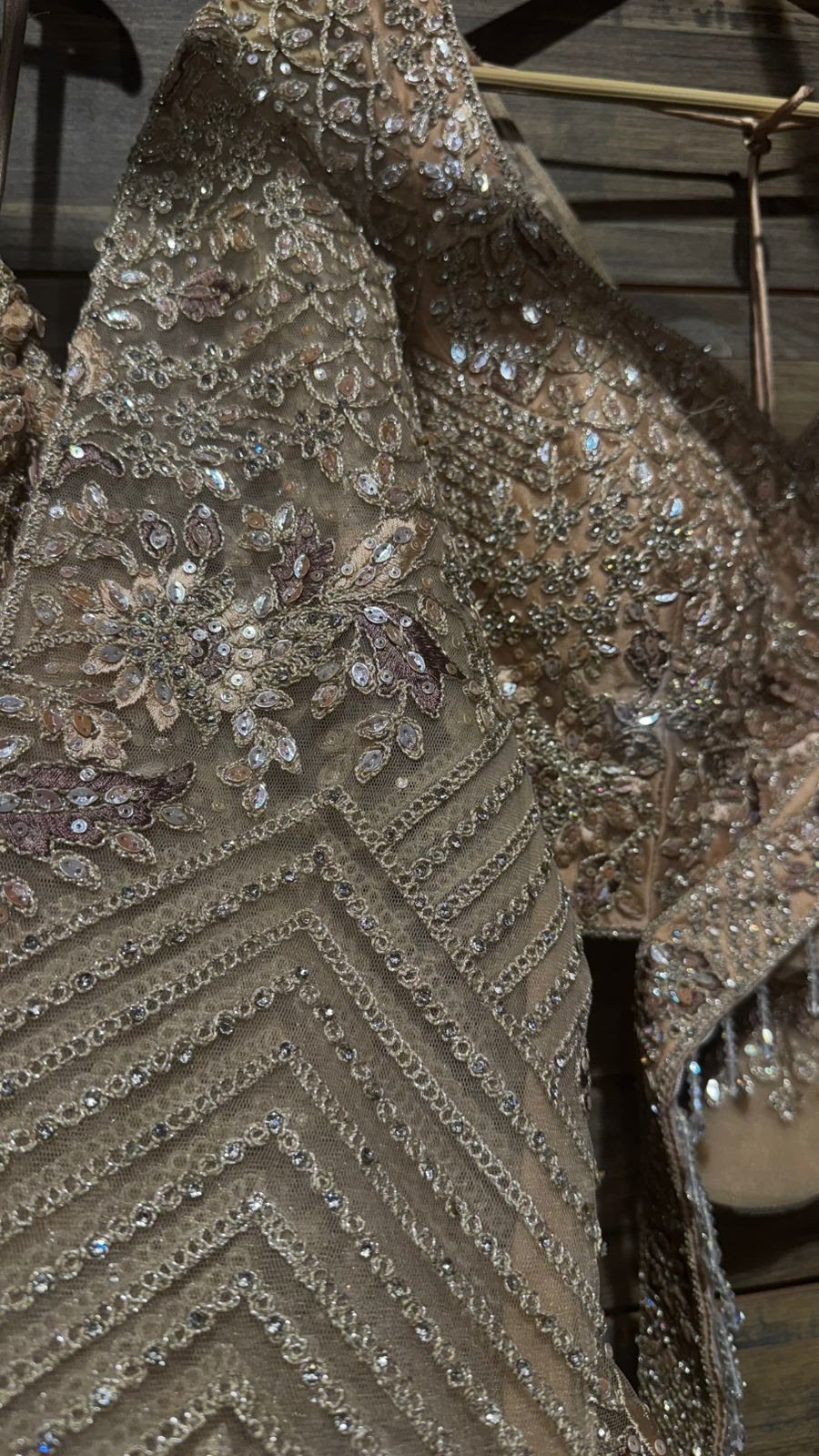 Imported Net Golden Lehenga with beautiful handwork in thread and sequence teamed with full handwork dupatta and blouse to brighten up your wedding affairs
