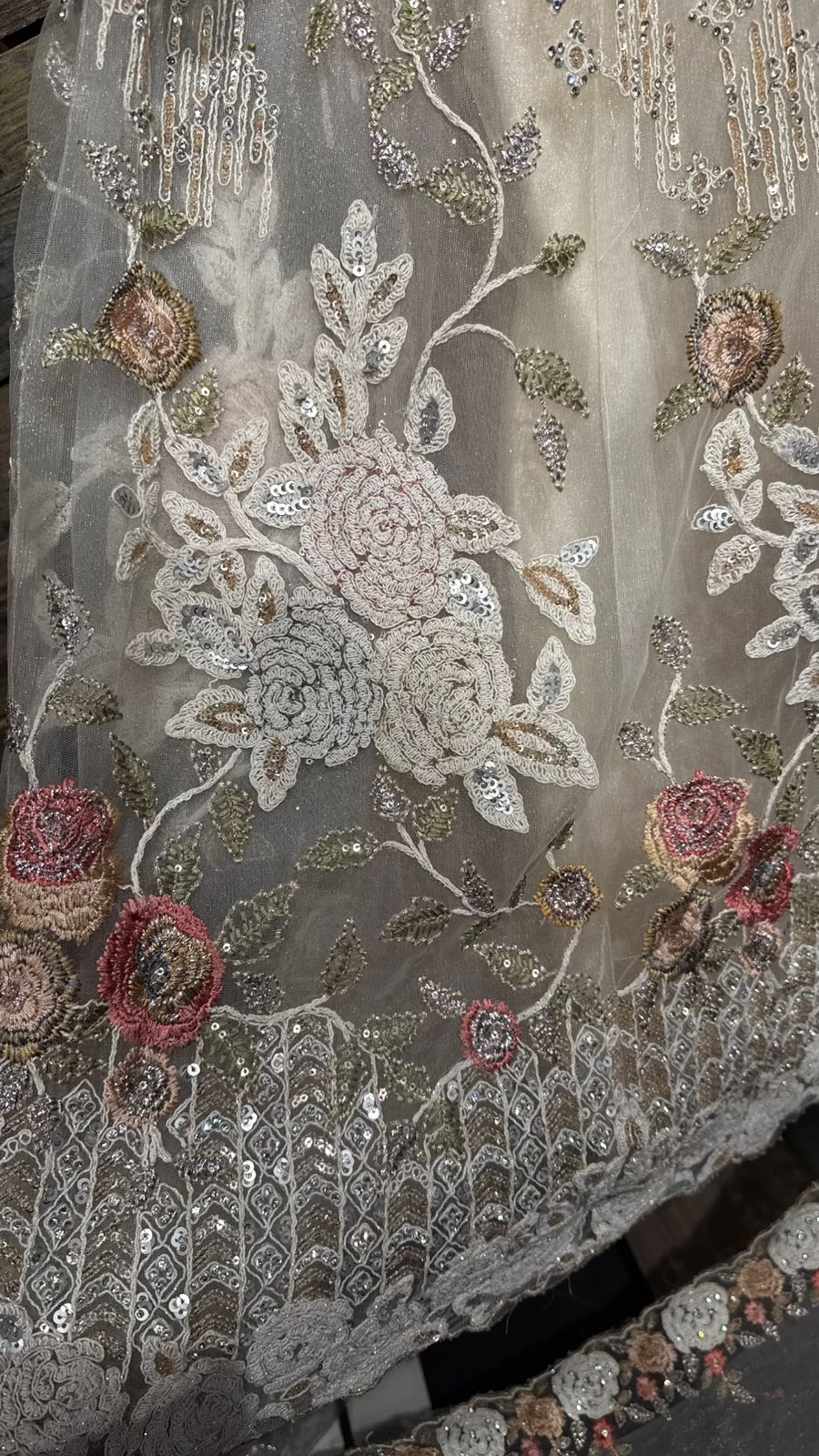 Imported Net Black Lehenga with beautiful handwork in colorful thread and swarovski teamed with full handwork blouse to brighten up your ceremonial affairs