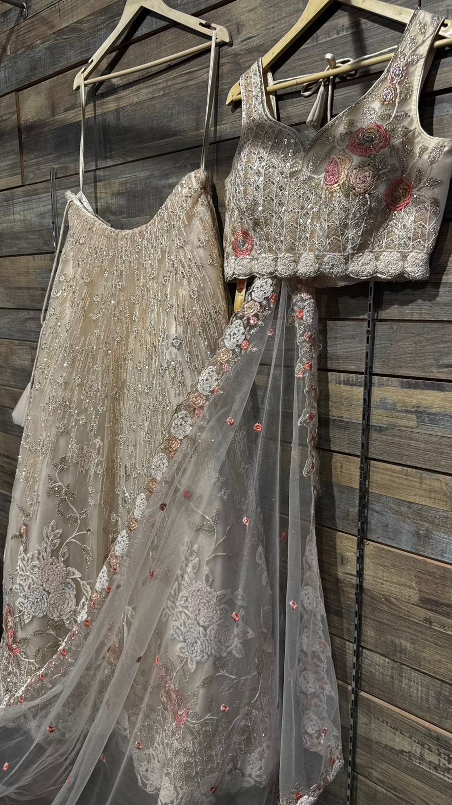 Imported Net Black Lehenga with beautiful handwork in colorful thread and swarovski teamed with full handwork blouse to brighten up your ceremonial affairs