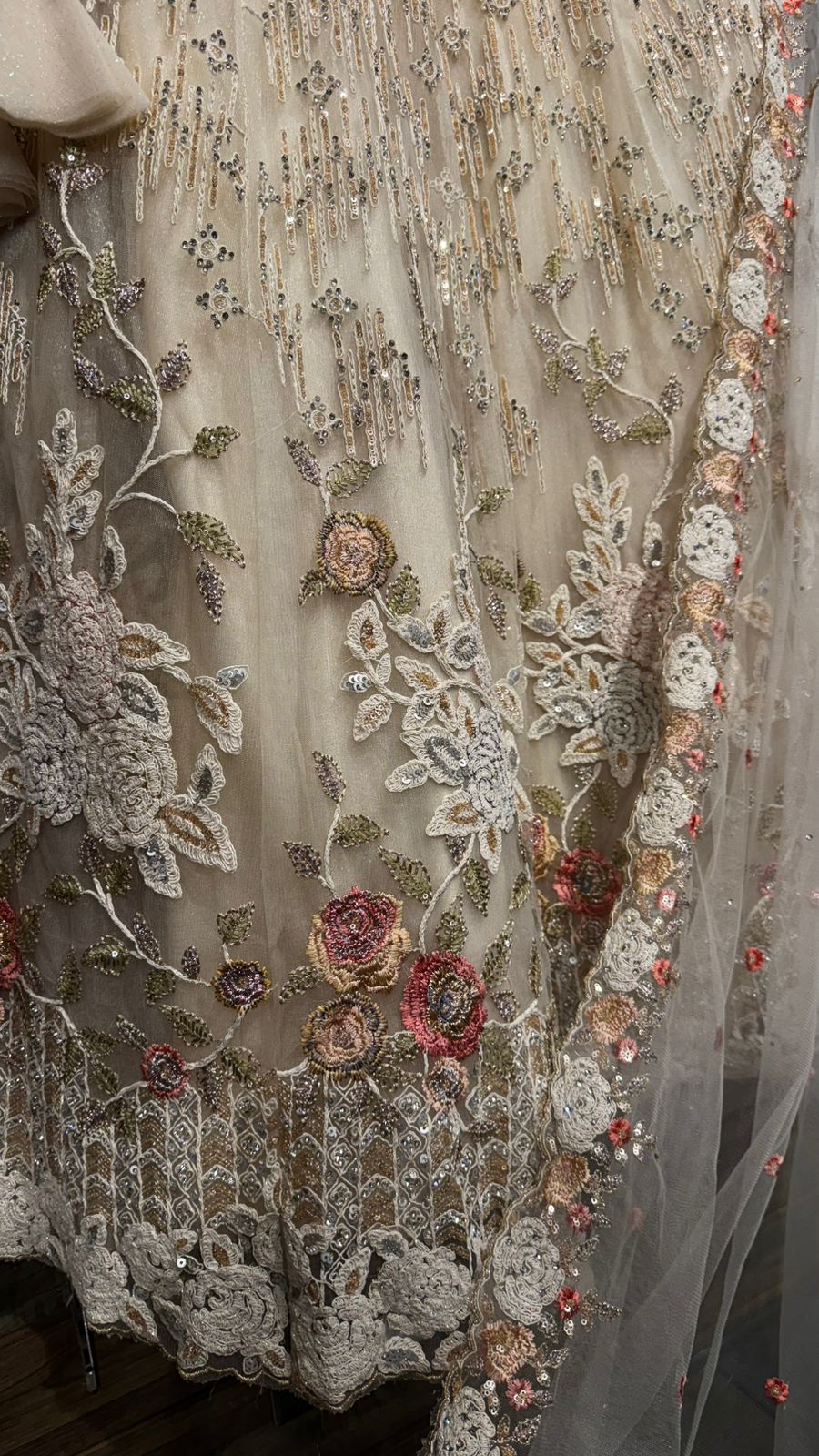 Imported Net Black Lehenga with beautiful handwork in colorful thread and swarovski teamed with full handwork blouse to brighten up your ceremonial affairs