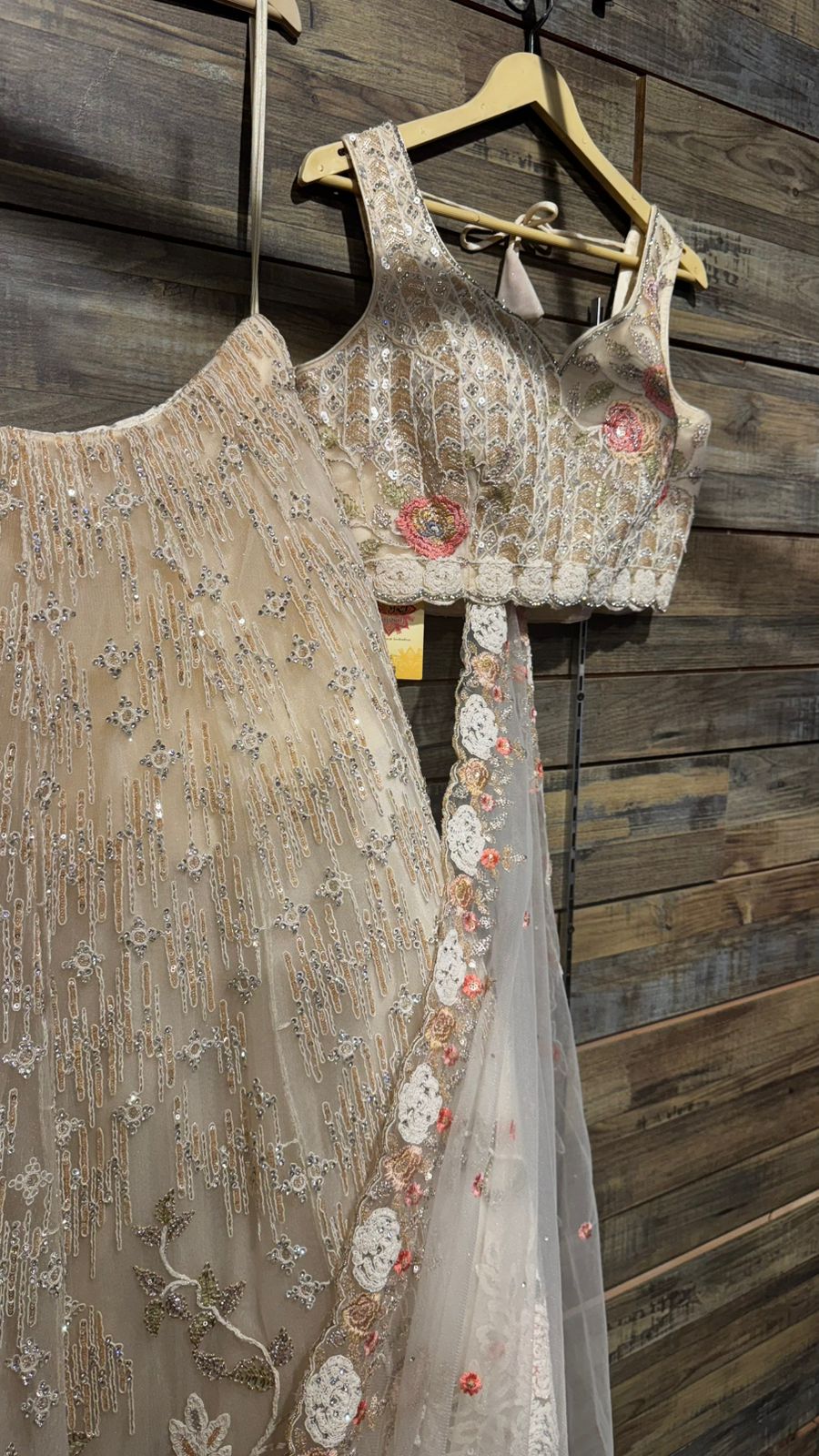 Imported Net Black Lehenga with beautiful handwork in colorful thread and swarovski teamed with full handwork blouse to brighten up your ceremonial affairs