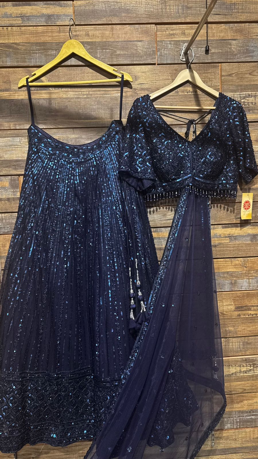 Imported Net Powder Blue Lehenga with beautiful handwork in sequence and beads teamed with full handwork blouse to brighten up your ceremonial affairs