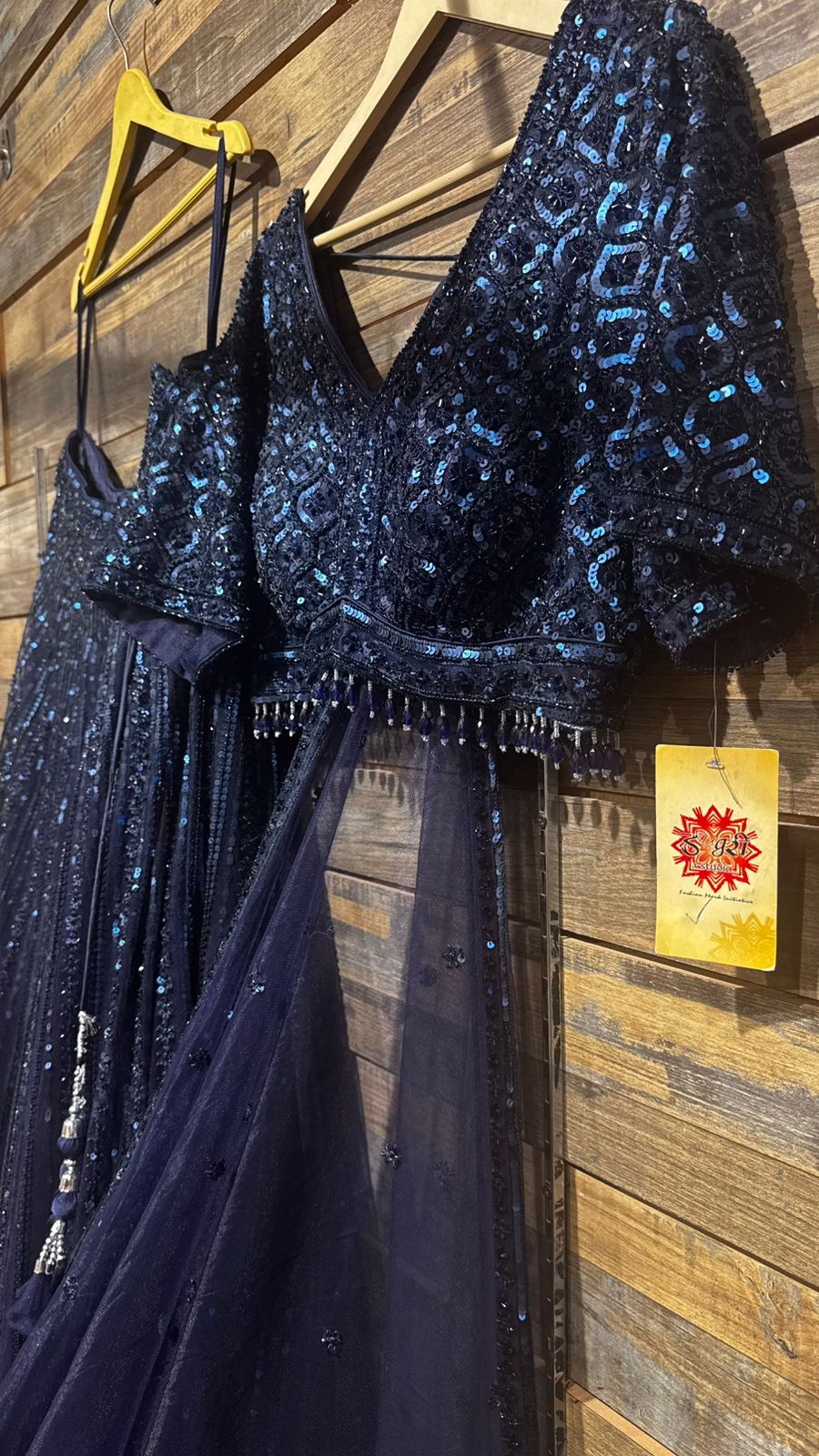 Imported Net Powder Blue Lehenga with beautiful handwork in sequence and beads teamed with full handwork blouse to brighten up your ceremonial affairs