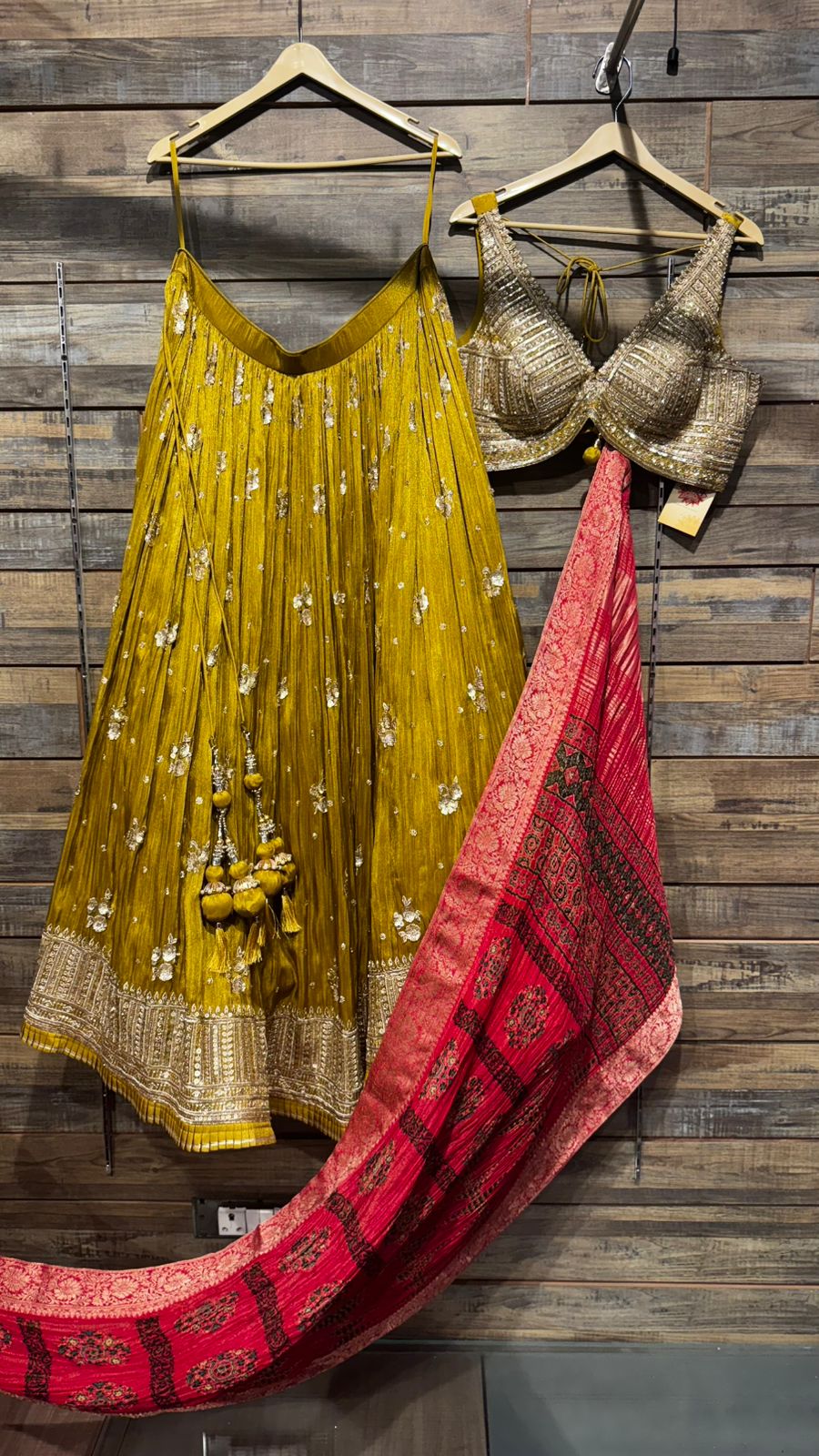 Mustard Color Lehenga with beautiful crush banarsi tissue fabric with handwork highlights over the skirt and intricate handwork on blouse and crush tissue dupatta in ajrak print