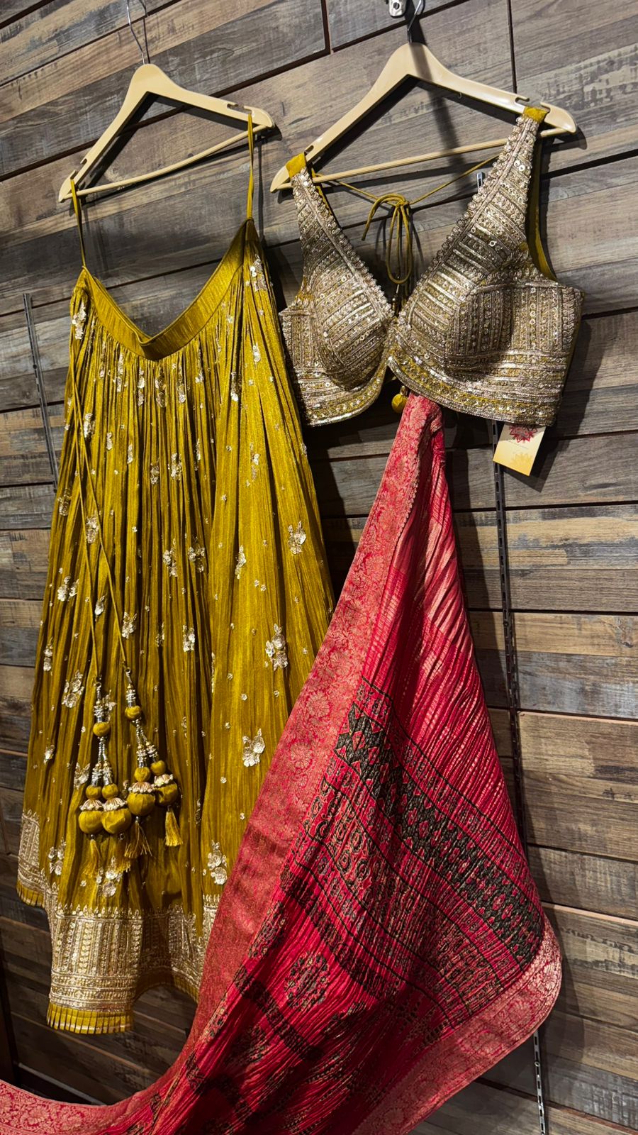 Mustard Color Lehenga with beautiful crush banarsi tissue fabric with handwork highlights over the skirt and intricate handwork on blouse and crush tissue dupatta in ajrak print