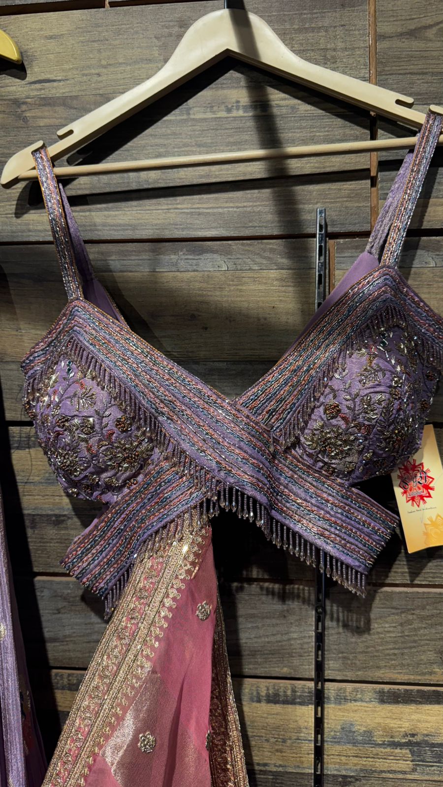 Lavender Color Lehenga with beautiful crush banarsi tissue fabric with banarsi weaving over the skirt and intricate handwork on blouse with criss cross neck pattern and organza dupatta with tissue patta weaving